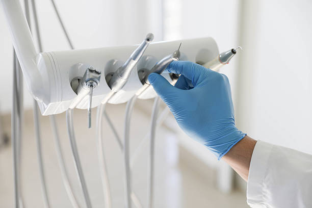 Professional Tooth Extraction technician working in Brownsville, FL